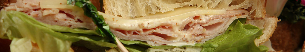 Eating Deli Sandwich at Cellar 19 Wine & Deli restaurant in Council Bluffs, IA.